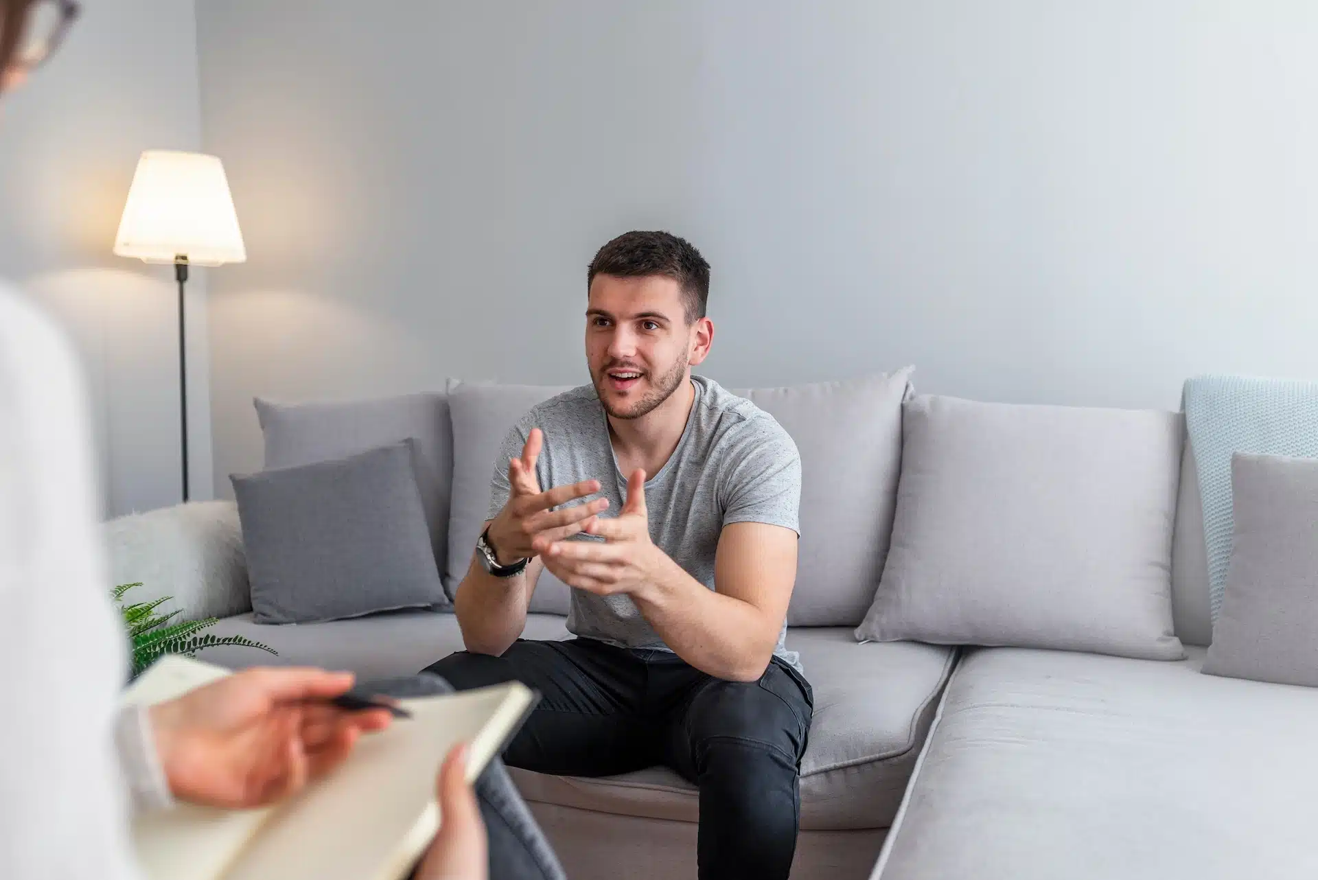nevada-mental-health-psychiatry-services-counseling Happy man receiving mental health counseling
