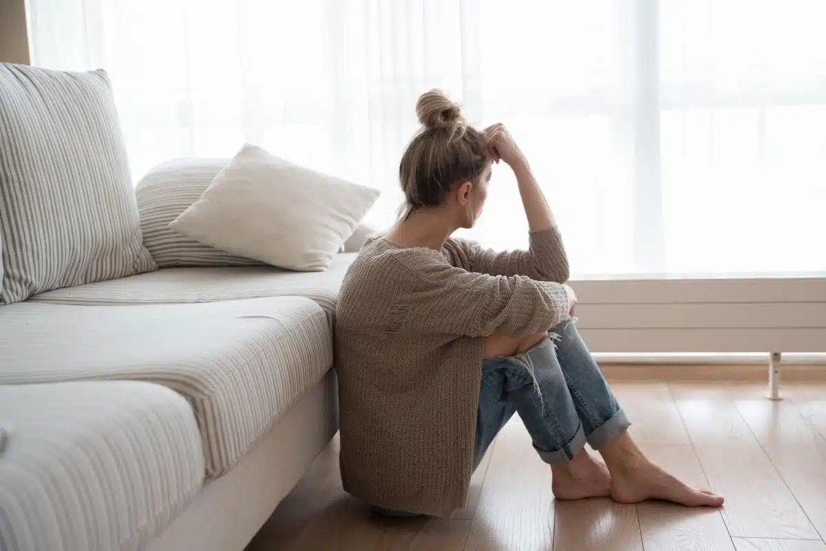 Woman experiencing symptoms of eating disorders