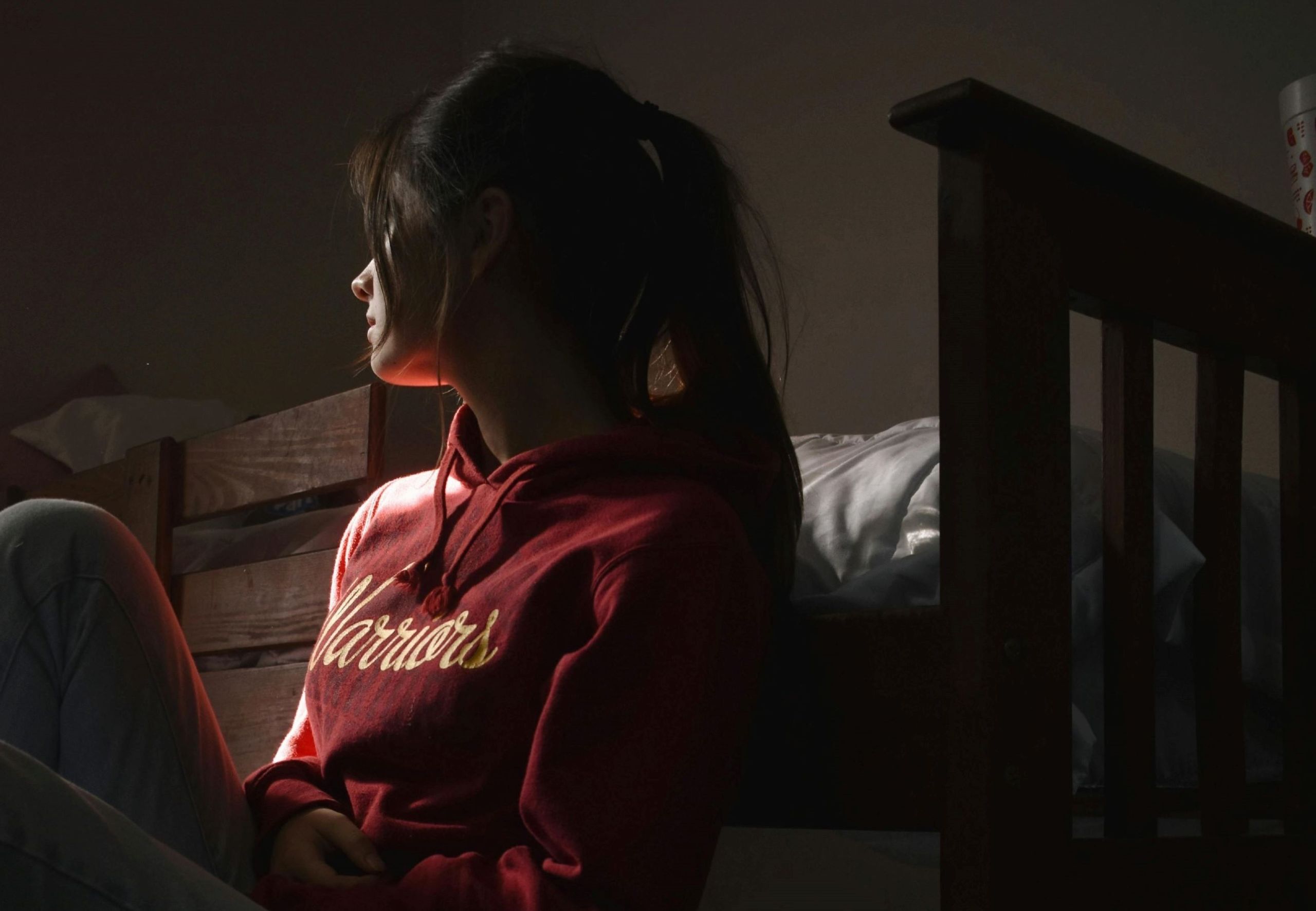 a young girl exhibiting signs of teen depression